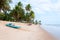 Beach at low tide with boat, Pititinga, Natal (Brazil)