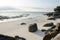 Beach at low tide, sand and rock