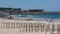 Beach in Matosinhos, Porto, Portugal with Cheese Castle fort in background