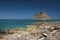 Beach of Monemvasia with a view at rock peninsula