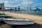 Beach next to a deep water terminal and silo for grain, derived products and oleaginous products in Trafaria, Portugal