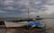 Beach and ocean pier panorama with fisher boat in chelem mexico