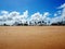 Beach with palm trees and blue sky