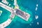 Beach party on pier aerial view