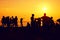 Beach Party.Silhouettes of teenagers at sunset in the evening.Bachelorette party on the coast.