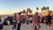 Beach party at Venice Beach - group drummers at sunset - LOS ANGELES, UNITED STATES - NOVEMBER 5, 2023