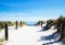 Beach path with wooden fence