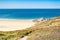 Beach Pit on Breton coastline in France Frehel Cape region with its sand, rocks and moorland in summer