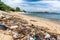 Beach polluted with garbage, litter and plastic waste, Generative AI