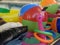 Beach and pool inflatables floating in the swimming pool water close up