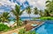 Beach with resort swimming pool at Seychelles