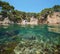 Beach on rocky coast fish underwater Mediterranean