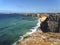 Beach in Sagres, Tonel, Portugal, with strong waves and wind