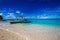 Beach, sailboat and tropical sea