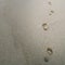 Beach sand footprints. Summer vacation background and business journey concepts