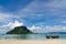 Beach sand mountain blue sky cloudy