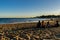 Beach of Santo Amaro de Oeiras - 10 March 2019 - group of friends to live together in the late afternoon sitting on the sand of th