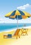 Beach scene: a beach umbrella and a chaise lounge
