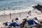 Beach scene on a busy spring day with people at leisure