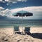 beach scene with two chairs and an umbrella perched on the golden sand