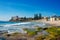 Beach scene with unrecognisable people relaxing on the beach