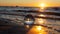 Beach and sea reflected in a sphere lying in the sand in the waves