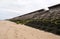 The beach and seawall south of blackpool constructed of concrete honeycomb type structures with steps