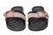 Beach shoes isolated. Close-up of a pair modern black pink ladies rubber bathing sandale isolated on a white background. Macr