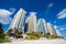 Beach side tall buildings Miami colorful blue sky