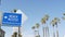 Beach sign and palms in sunny California, USA. Palm trees and seaside signpost. Oceanside pacific tourist resort aesthetic. Symbol