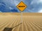 Beach sign on sand dune