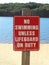 Beach sign warning no swimming unless lifeguard on duty