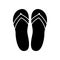 Beach slippers black icon .