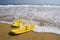 Beach slippers on a sandy beach