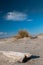 Beach with small Dune and Blue sky.