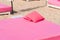 Beach soft sun loungers with pillows pink colour