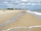 The beach at southwold with the huts and pier