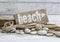 Beach still life with Sign