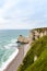 The beach and stone cliffs in Etretat, France