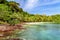 Beach and stone ridge on an island in the middle of the ocean