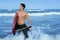 Beach summer beach portrait of young surfer