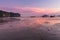 Beach and sunset at Ao Nang beach, Krabi, Thailand with traditional thai boat