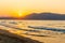 Beach on sunset in village Kavros in Crete island, Greece. Magical turquoise waters, lagoons.