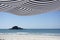 Beach tents and the sea at sundown