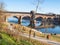 Beach of Ticino River and view of Ponte Coperto