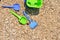 Beach toys - bucket, spade and shovel on the beach