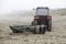 Beach tractor on a misty morning