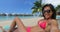 Beach travel selfie video by woman on luxury beach vacation luxuy resort hotel