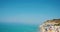 Beach Tropea - People / Bathers enjoying the sun - Sky to Beach - Camera pan from the Blue Sky on Beautiful Beach