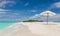 Beach umbrella on the beach Atoll island Maldives